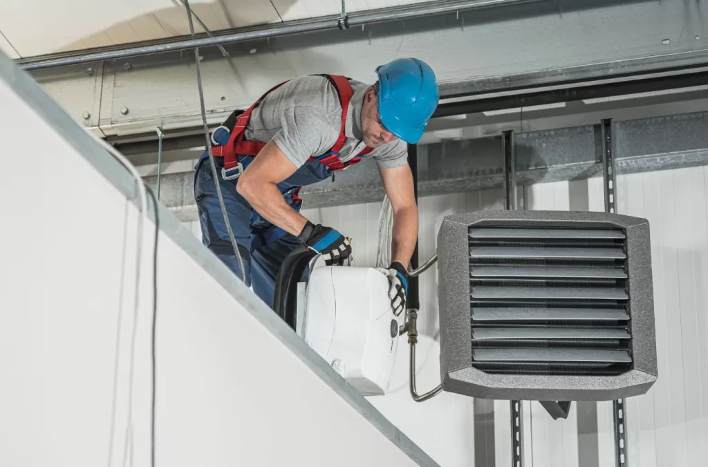 Why choose plumbing and HVAC services in Boulder, CO by MESA PLUMBING, highlighting a team member conducting a plumbing repair, plumbing & HVAC services near me.